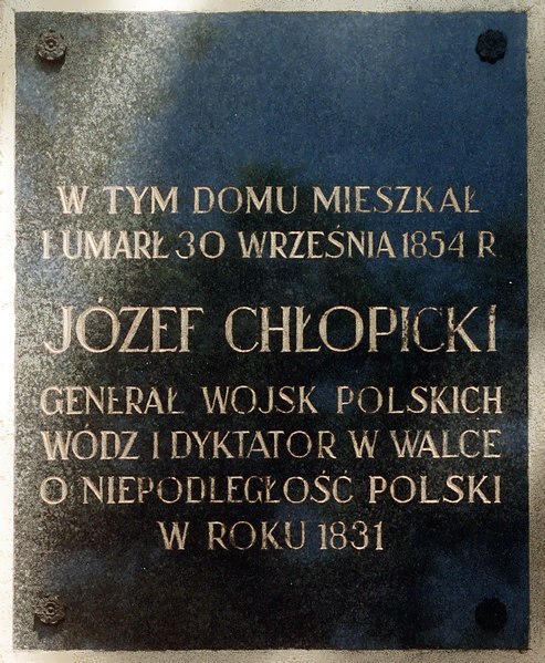 Tablica na kamienicy nr 38  przy Rynku Głównym w Krakowie (fot. Januszk57/Wikiepdia)